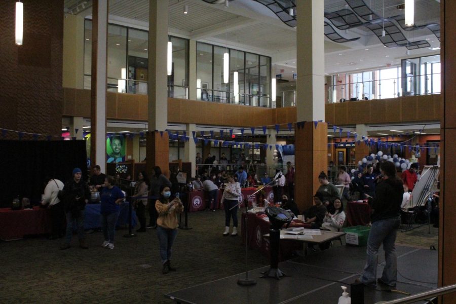 Students walk around Jobe Lounge during the Nacho Ordinary Club Fair hosted by Student Life on Jan. 25th, 2023.