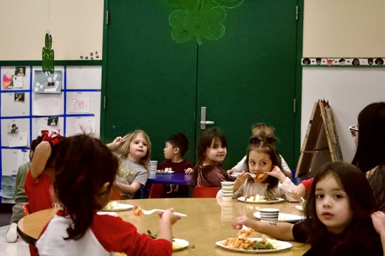 The kids are socializing with the Early Development Staff and students.  Picture was taken on Mar. 3, 2023.