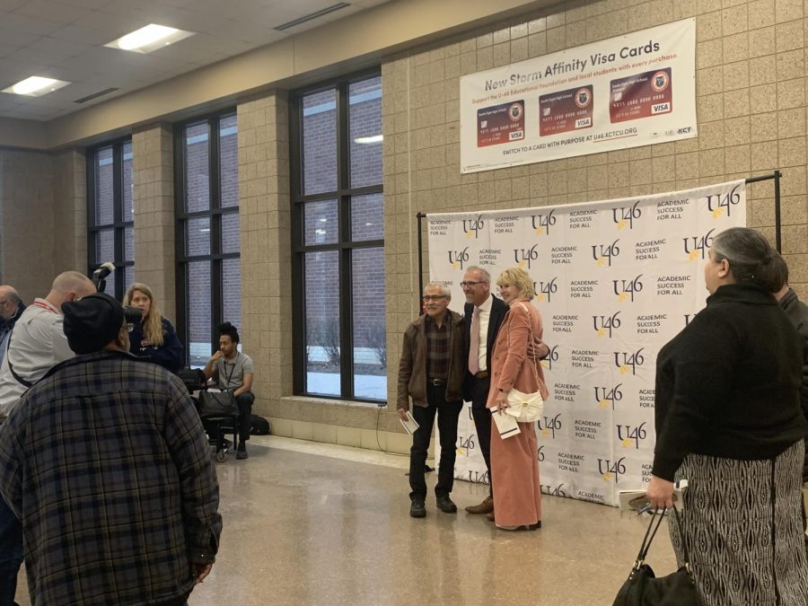 Dr. Tony Sanders posing with attendees during the reception at his farewell celebration at South Elgin High School on Feb. 15, 2023.