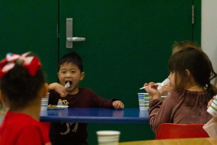 Students eat lunch and socialize at ECCs Early Childhood Lab School on March 2, 2023. 