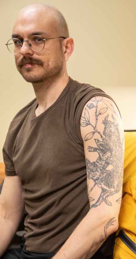 Assistant Professor of English Composition Patrick Carberry showed off his sleeve tattoo on March 15, 2023. Comprised of multiple designs coming from different tattooing sessions, Carberry stated that his fox, bull, and bird tattoo can represent his love of animals, even though he said that the tattoo doesnt have a concrete meaning.