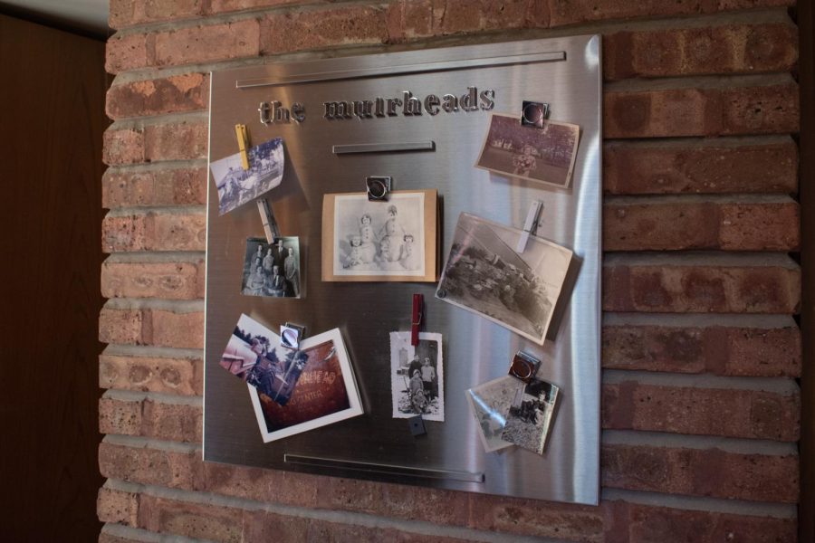 Original family photos hang in the kitchen at the Muirhead Farmhouse in Hampshire, IL on April 6, 2023. The Muirhead family was one of the first settlers in Kane County in the late 1800s.