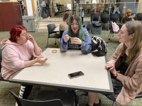 Finn Galloza (left), Yvonne Hamilton (center), and Jennifer McDonnell (right) converse in the Jobe Lounge on April 19th, 2023.