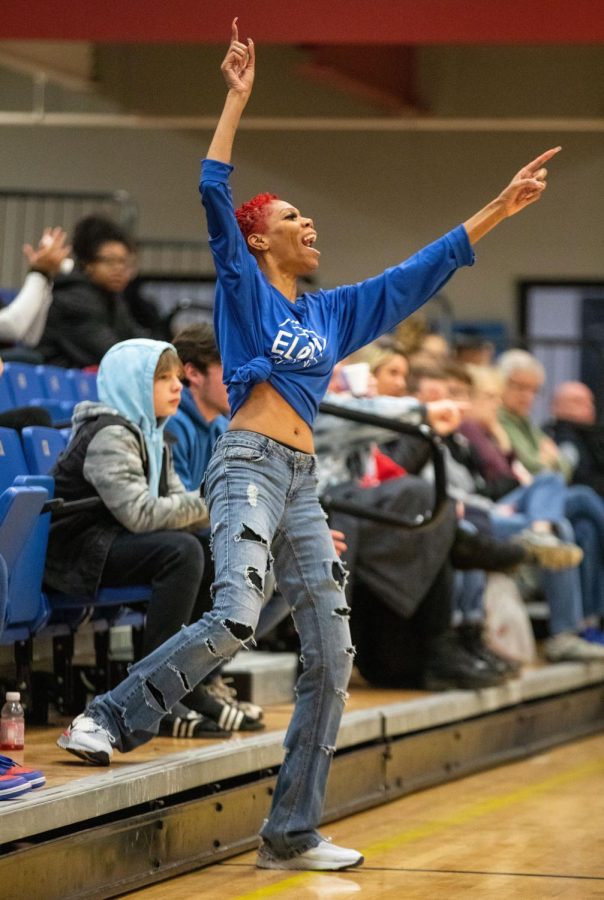 Fan Renee P. cheers on Elgin Community College’s basketball team during a home game against Waubonsee Community College at ECC on Wednesday, Feb. 22, 2023. 