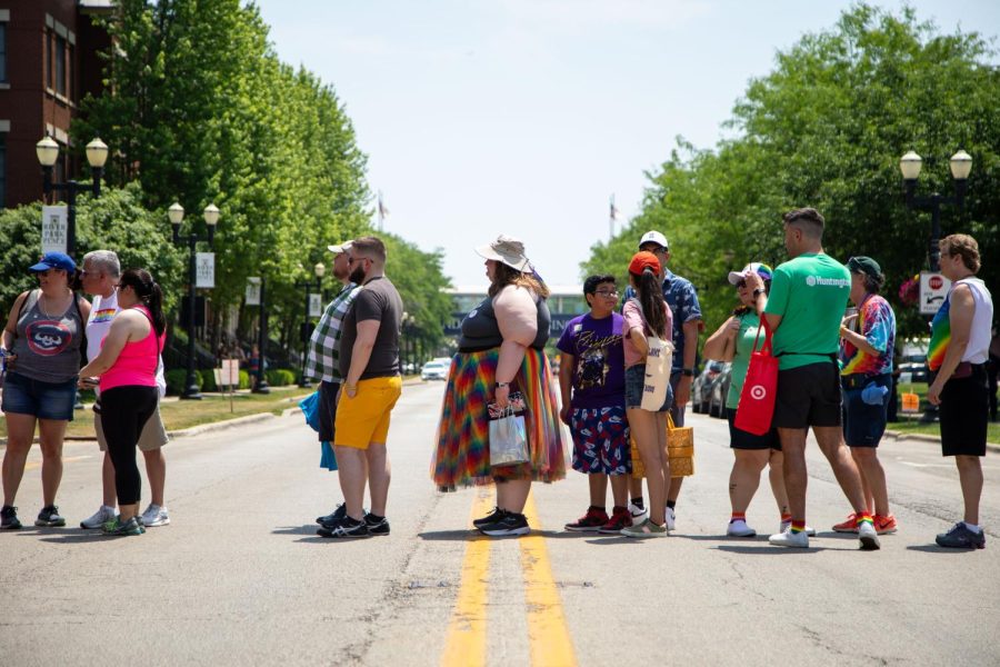 Festival attendees line up at a street vendor during Elgins Pride Festival at Festival Park in Elgin on Saturday, June 3, 2023. 