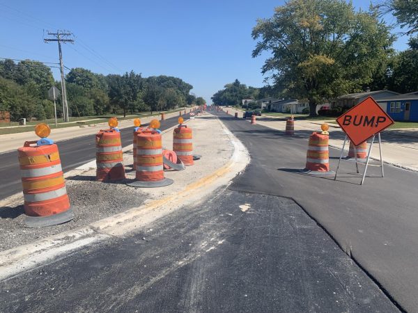 New asphalt surface on center lanes of W. Schaumburg Rd on Sept. 15, 2023.