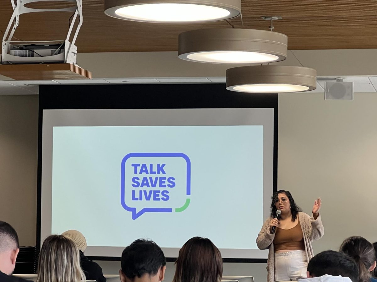 Programs Manager for AFSP Illinois Luma Bonilla-Webster talks about different methods of talking to people who are in crisis at the Suicide Prevention Awareness Event on Sept. 20, 2023.