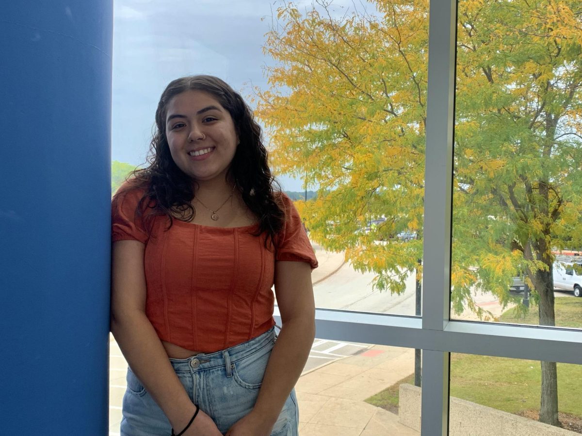 Analiz Salazar posing for a photo in Building F. This fall marks her first semester at ECC.