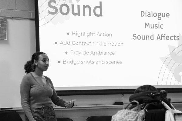 Co-founder of film club Naomi Gebremichael describes the importance of sound in film during the film club meeting on Sept. 26, 2023.