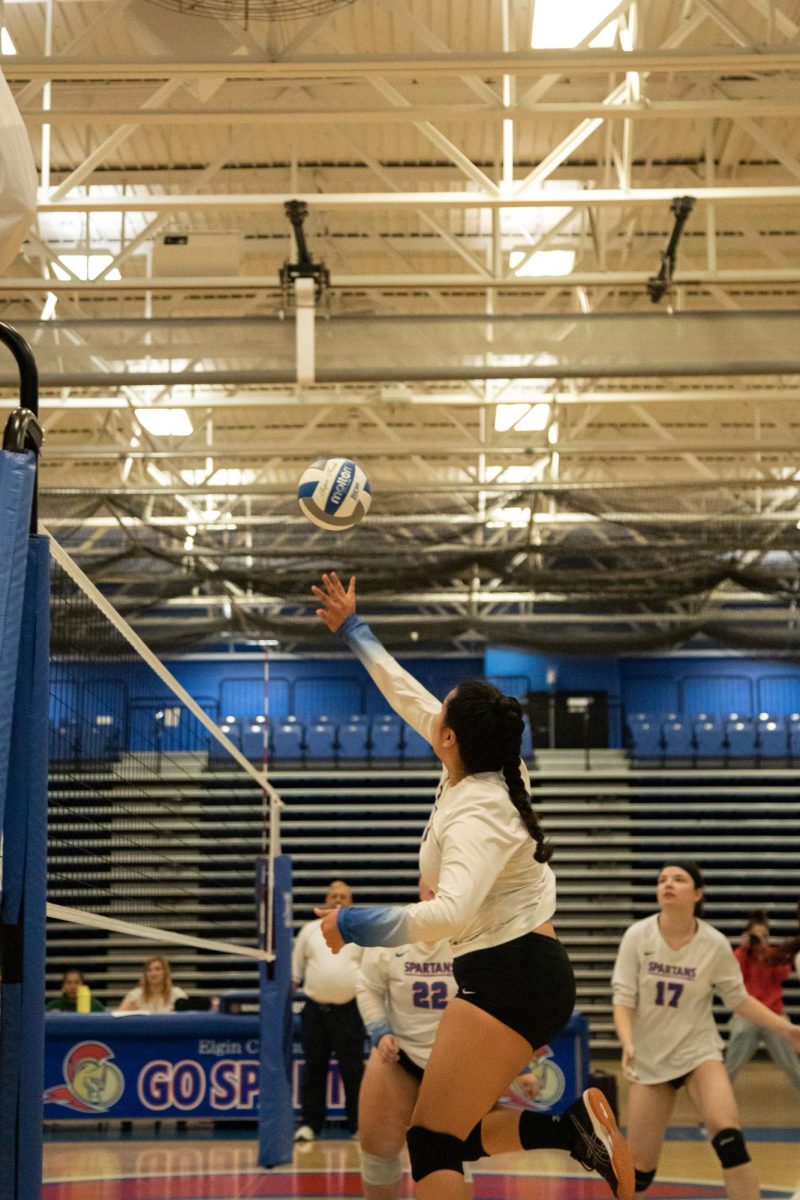 SO. Guadalupe Barrera spikes the ball over the net against College of Lake County on Sept. 27, 2023.