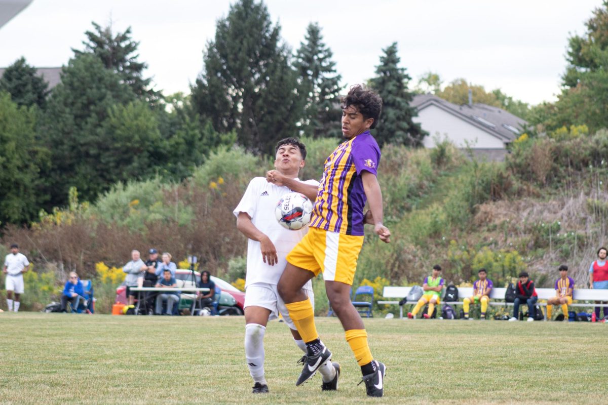 Midfielder Joel Gutierrez (7) challenges the ball against a player of McHenry County College on Sept. 7. 2023. As of Sept. 13, 2023, the Mens Spartan Soccer team is 2-4.