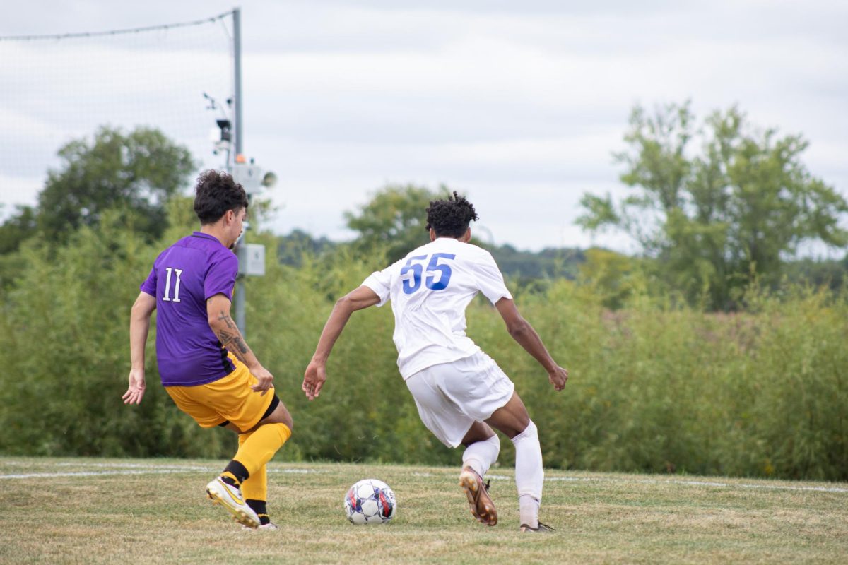 Midfielder Miguel Navarro drives the ball past a McHenry County College defender on Sept. 7, 2023. As of Sept. 13, 2023, the Mens Spartan Soccer team is 2-4.
