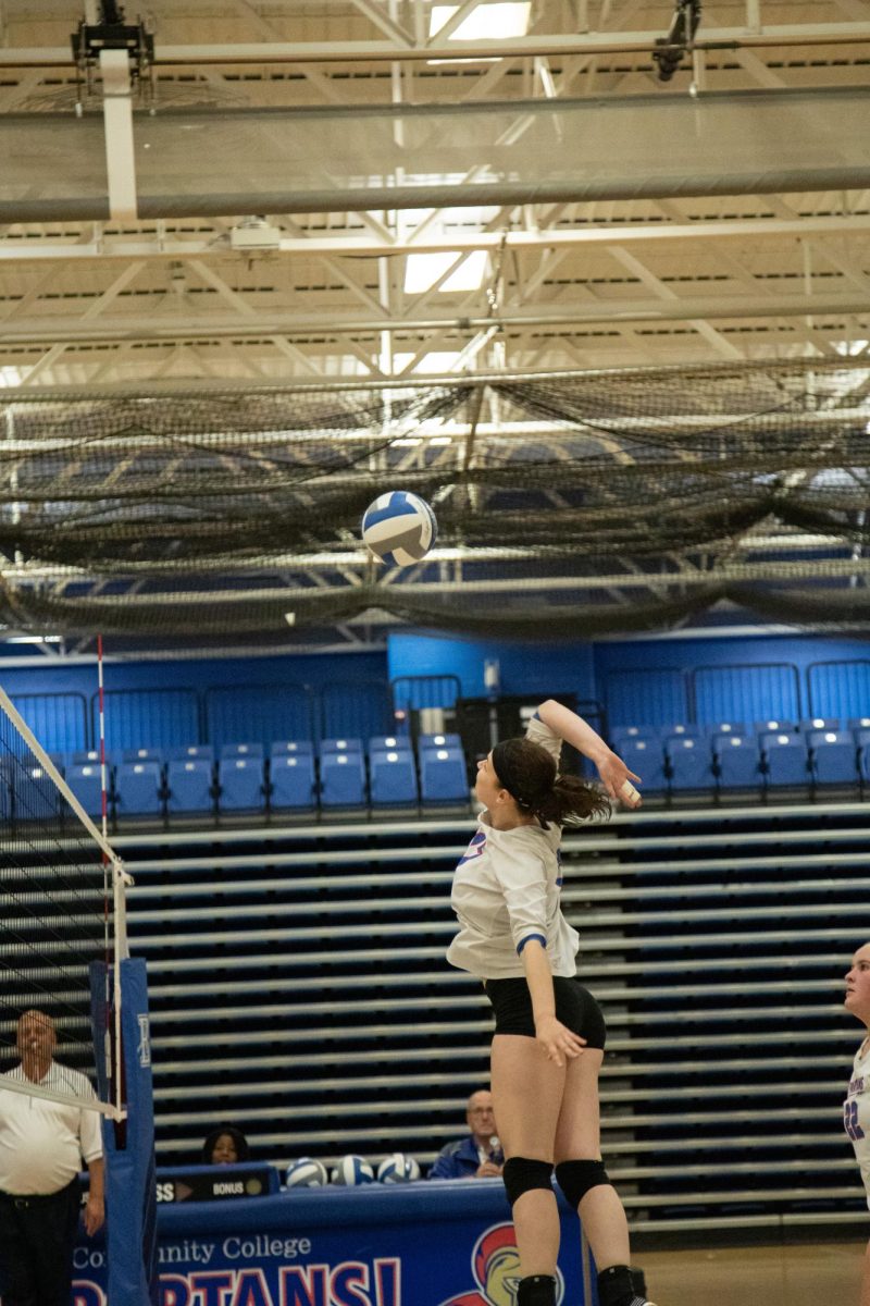 Fr. Lilithe Buttron gets some air to spike the ball against College of Lake County on Sept. 27, 2023.