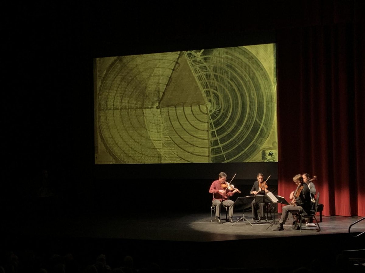 The Fry Street Quartet performed in front of images that depicted the current state of our Earths biosphere during Rising Tide: The Crossroads Project at the Blizzard Theater on Oct 6, 2023. 