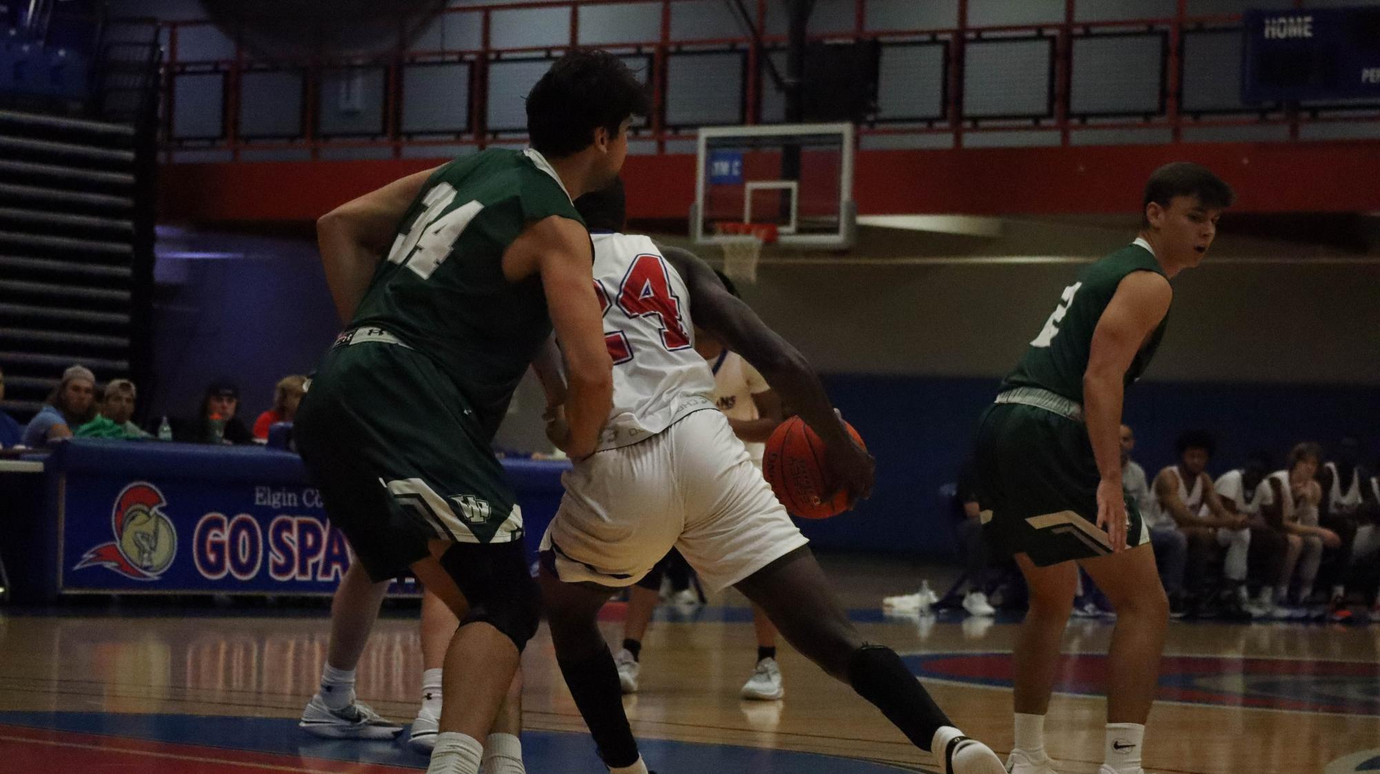 Photos: Men's Basketball loses 85-103 against Illinois Wesleyan University