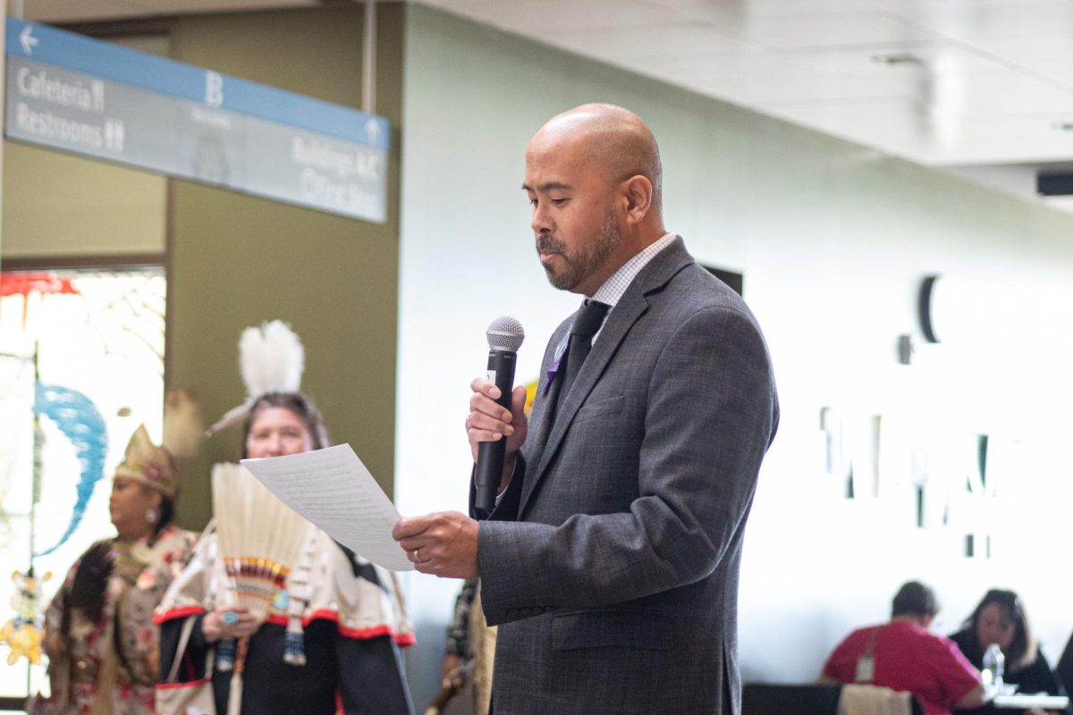 Executive Director of Equity, Diversity and Inclusion Anthony Ramos gives an introductory speech about the importance of LatinX Heritage Month and Indigenous Peoples Day at the Black Hawk Dance Troupe event in the Jobe Lounge on Oct. 11, 2023.