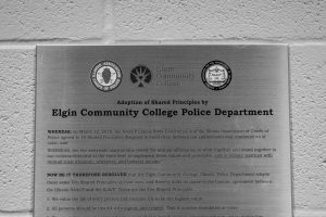 The official metal plaque of the Ten Stared Principles hangs in D-140.