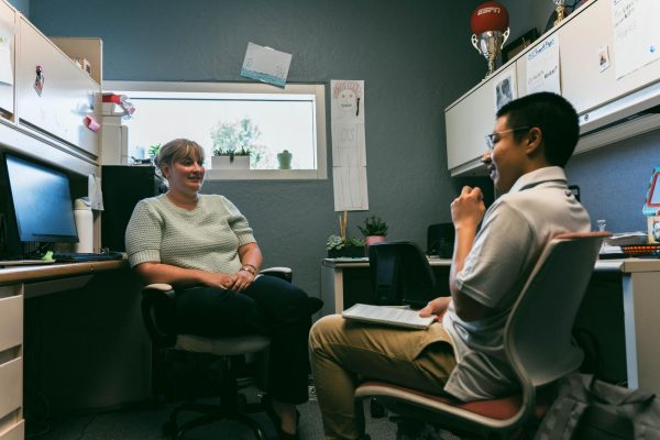 Melanie Schaefer sits across from staff-writer, Daniel Namchapassak, to talk about her role at ECC.