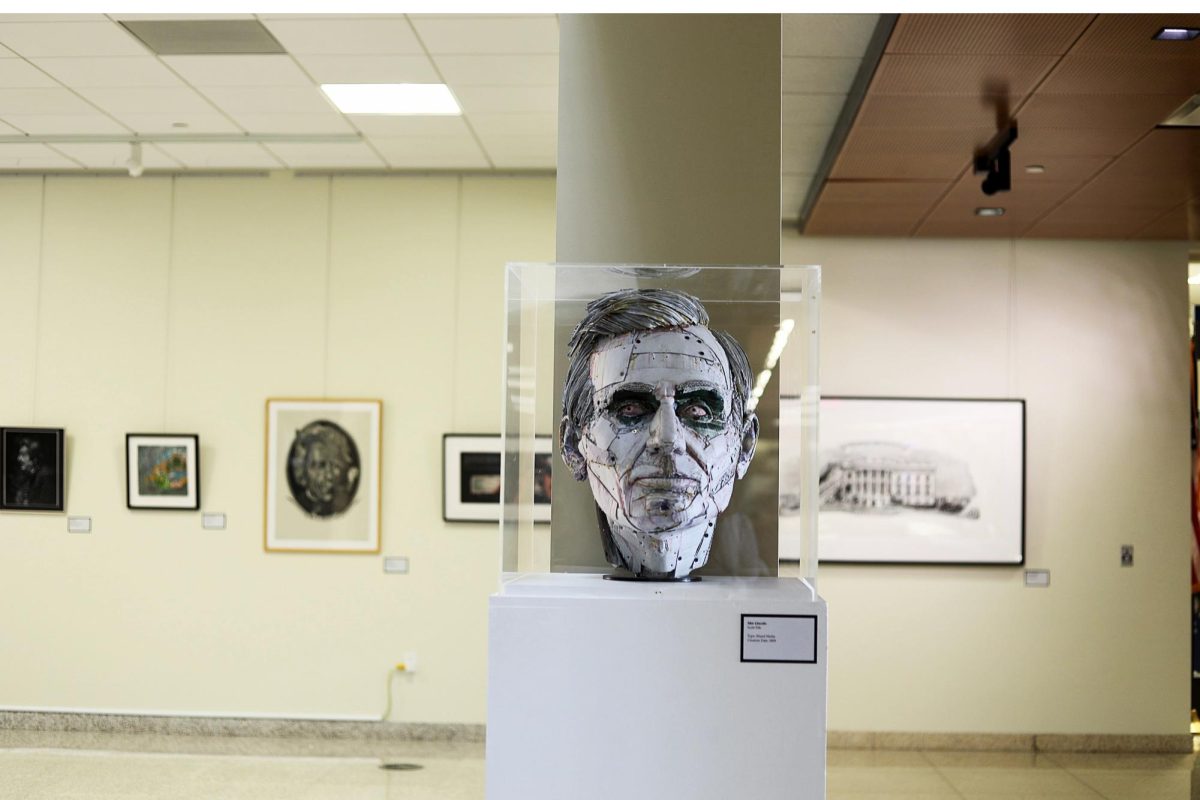 Locations of where art can be found around campus: Sculpture of Abraham Lincoln and art work behind it in Building B hallway on September 4th, 2025.