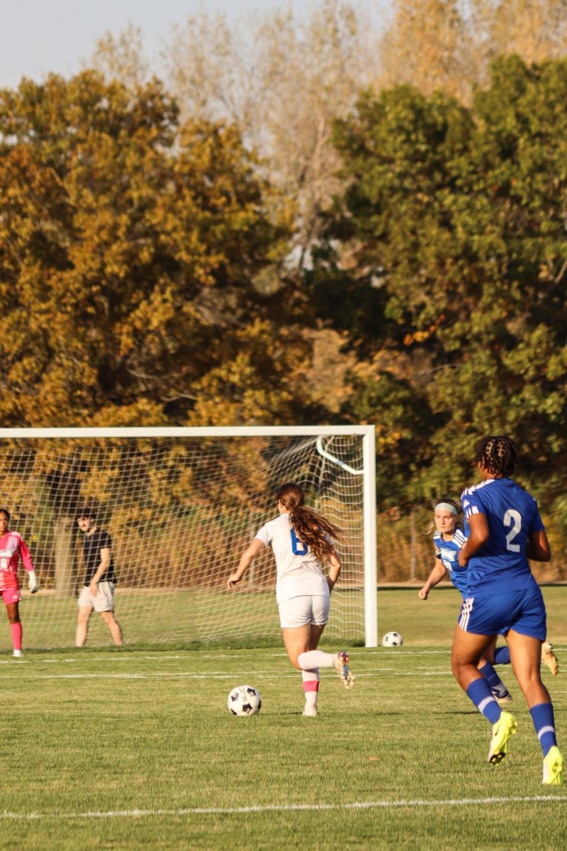 Sophomore midfielder, Adeline Kinsella, looking to make a play against the Harper Hawks on October 17, 2025. The Elgin Spartans Women's Soccer Team won their Sophomore Recognition game, scoring 4-0 against Harper College.