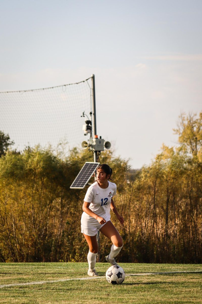 Number 12, Jacqueline Alvarez, looking for an open teammate during the Sophomore Recognition game against Harper College, on October 17, 2025.