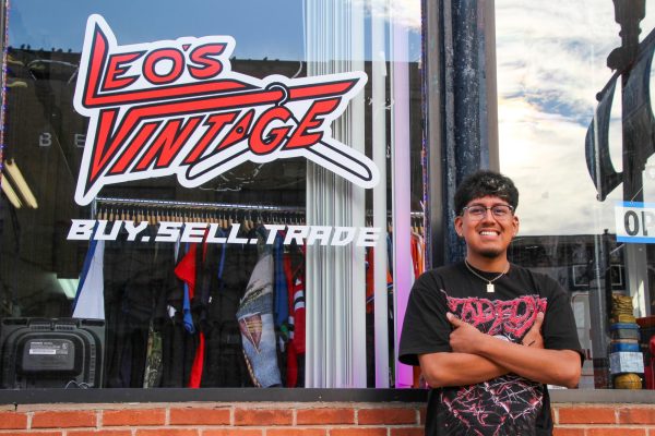 Leo Navarro stands in front of his store, Leo's Vintage, on November 2nd, 2025. Leo was celebrating the 1st anniversary of his store's opening.