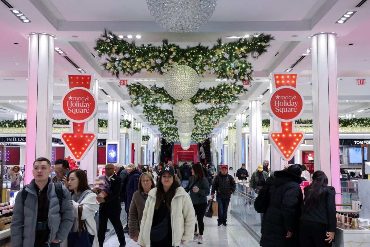 People shop in Macy's Herald Square ahead of Black Friday and Christmas in New York City, U.S., November 24, 2025. REUTERS/Kylie Cooper