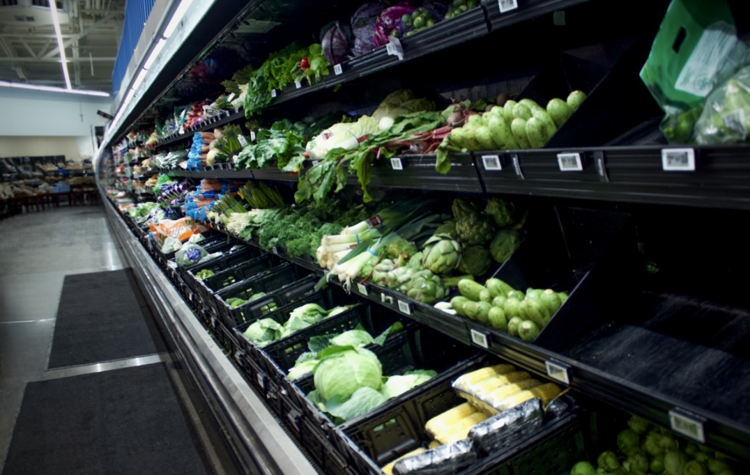 Refrigerated produce aisle at Walmart in Carpentersville on December 2, 2025 