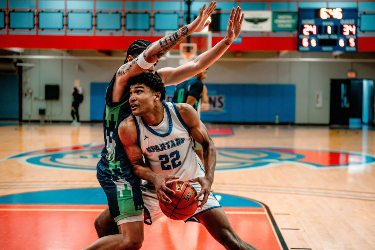 Jaylen Wells backs down his defender to attempt the points in the paint, on January 8th 2026. Wells' aggressive play had him gathering a team-high 7 rebounds, shared with Davee Flowers.