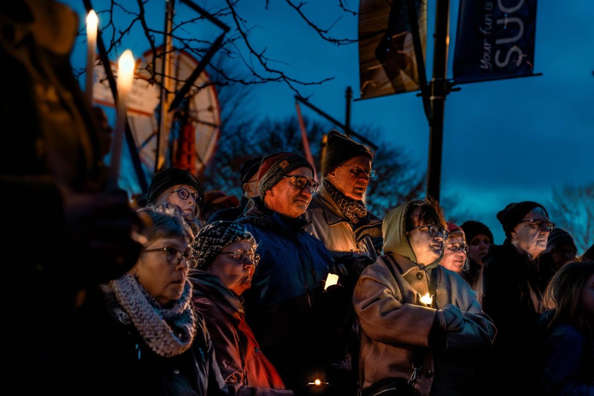 Locals listen attentively to speakers while at a Batavia vigil for ICE victims, on January 9th 2026. The gathering had well over 30 citizens in attendance, sharing frustration over ICE-related operations across the nation.