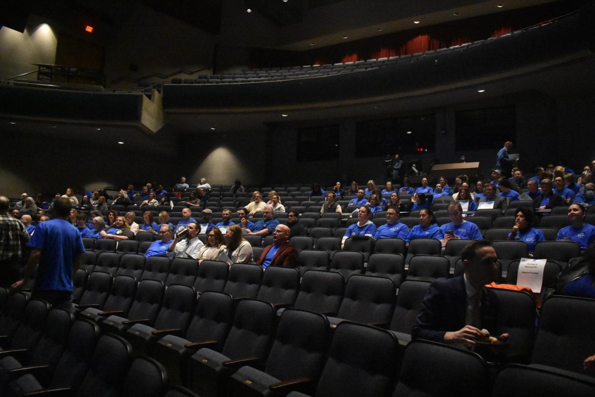 The Blizzard Theater is filled with the color blue--ECCFA's unified shirts.