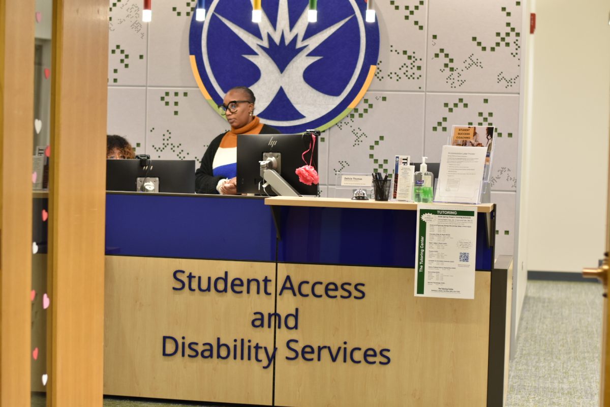 Administrative Assistants, Delicia Thomas and Dagmawit Mekonen talk through a task at the front desk of the new Disability Services office in Room F120 on Jan. 29, 2026. Staff members assisted students with accommodation requests, coordinated academic support services and answered any questions.