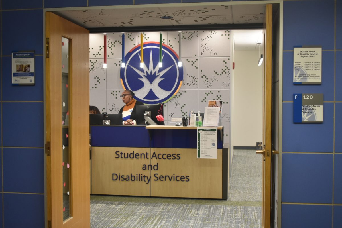 Administrative Assistant, Delicia Thomas works at the location of the new Disability Services office on Jan. 29, 2026. The office moved to the updated space to improve accessibility and resources for students seeking support. Delicia Thomas (Administrative Assistant) and Dagmawit Mekonen (Administrative Assistant) sit inside ready to help students at the front desk.