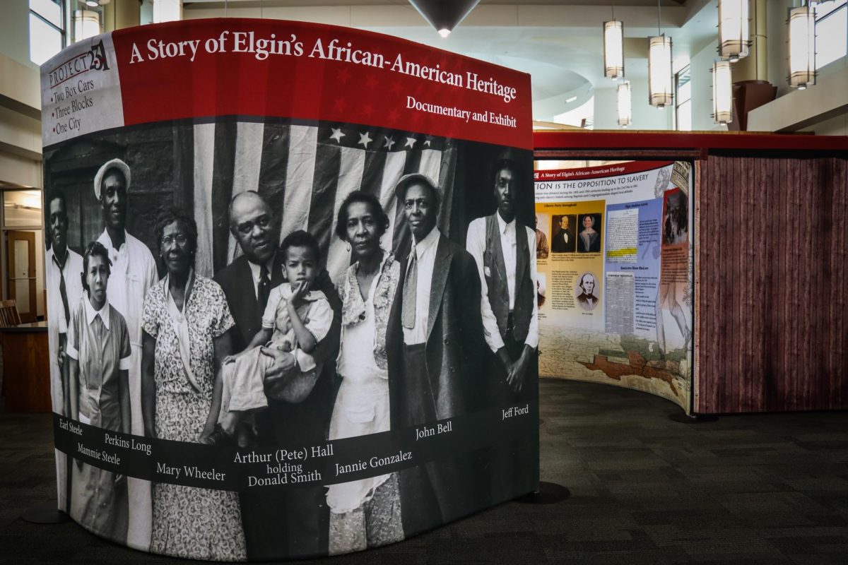"A Story of Elgin's African-American Heritage", a Project 2-3-1 Exhibit in Elgin's Gail Borden Library, on January 30, 2026. Project 2-3-1 refers to the two box cars, three blocks, and one city the first African Americans in Elgin had to utilize. The exhibit is meant to compliment the award winning documentary about the history of African Americans in Elgin.