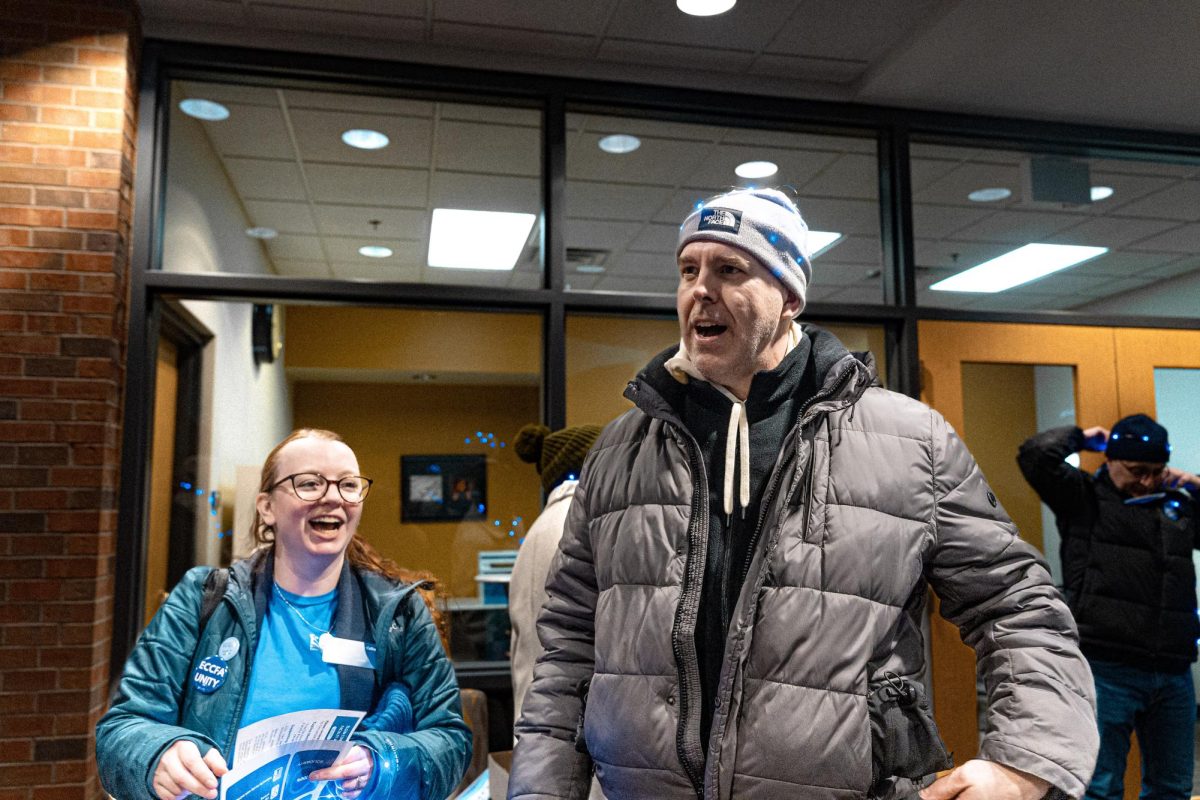 ECCFA members Lauren Sullivan and Dan Kernler discuss their roles within the organization prior to picketing, on January 27th 2026. In their time at ECC, Sullivan has been an adjunct librarian since 2021, while Kernler has been a professor of mathematics for over 10 years.