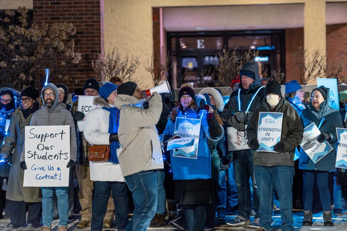 Faculty members chant and picket outside Building E, on January 27, 2026. Members lined the sidewalks prior to the meeting, standing in the freezing January cold together in unity.