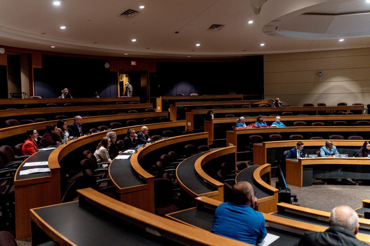 The Siegle Auditorium was near-empty as most faculty members leave the meeting after speeches concluded, on January 27, 2026. 