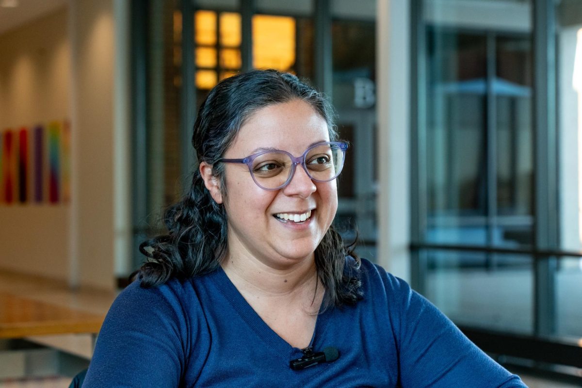 Gisela Lopez Lauderdale talks her role within Elgin Community Bikes, on January 28, 2026. Lauderdale helps communicate with volunteers, and organizes events on behalf of the organization, noting the organizations large amount of participation amongst volunteers.