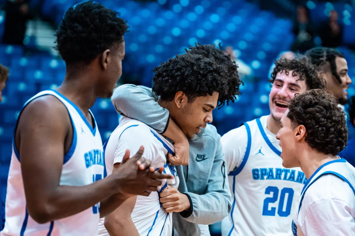 WALK-OFF: Davee Flowers is swarmed by teammates after hitting his game-winner over McHenry County College, on January 15th 2026. Flowers ended the game with a team-high 28 points, shooting 10/29 from the field.