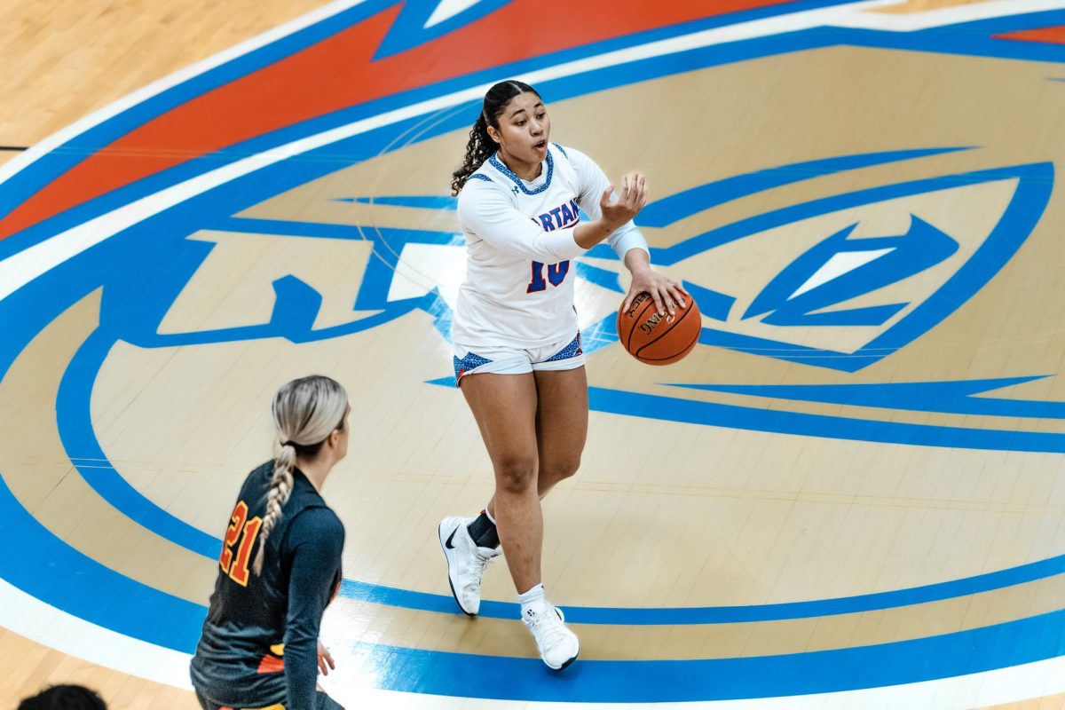 Guard Alisea Doan directs her teammates into position against Waubonsee Community College, on Feb. 12, 2026. The sophomore has accumulated over 230 points in her tenure as a Spartan, scoring 143 this season.