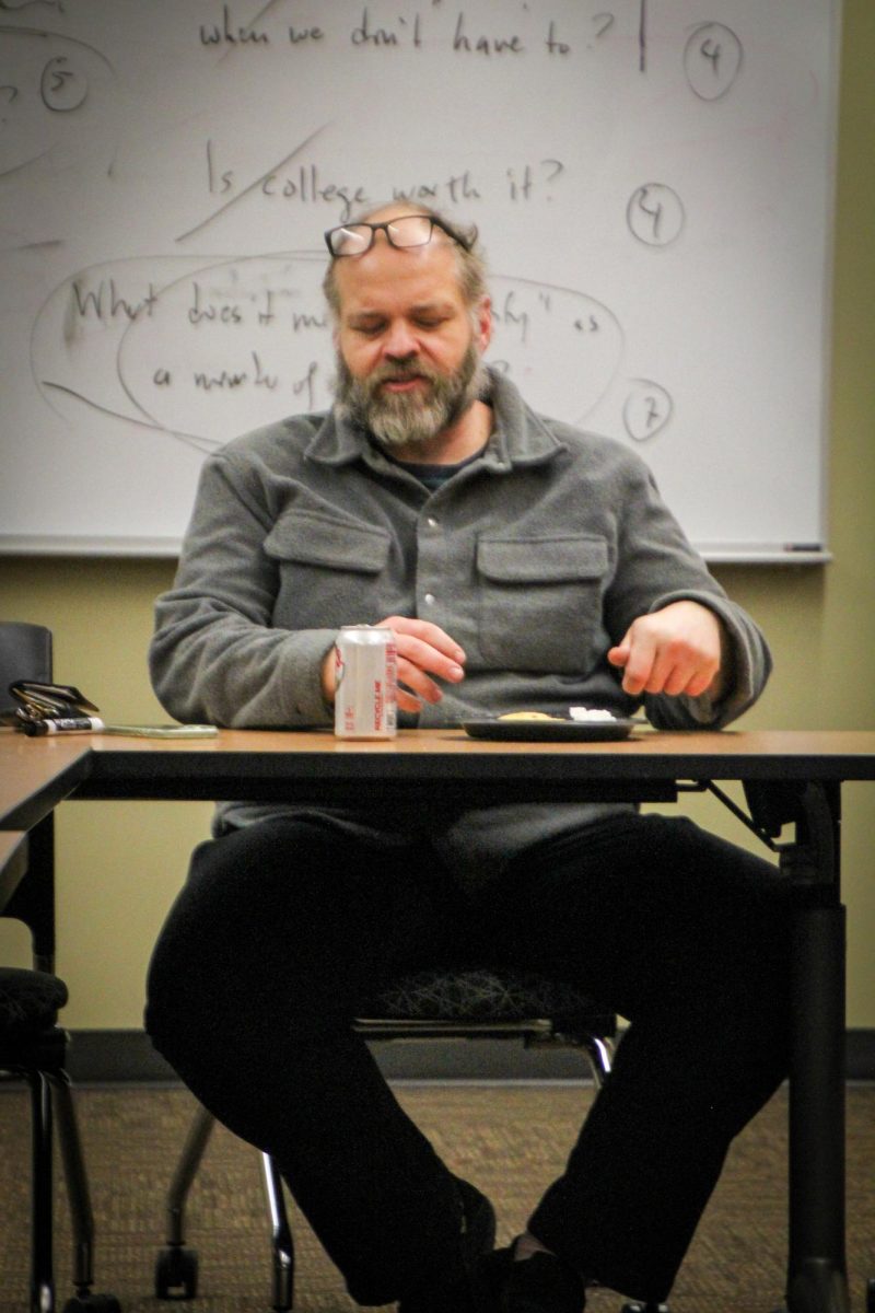 Geoffrey Pynn, ECC humanities Professor, leads Socrates Cafe in the ECC Library Instruction Room, on Feb. 24, 2026, guiding the community-driven philosophical discussion group that explores life’s fundamental questions. Pynn’s first semester leading Socrates Cafe was in 2023, and he has remarked that he is enthusiastic to be returning for a second semester this spring.