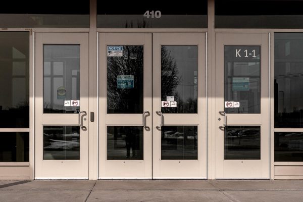 Building K prohibit students from being in possession of a firearm. A sign displaying a firearm is present across all entrances to buildings on campus.