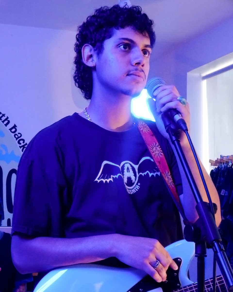 Christian Cuellar, lead singer of Vatos Tristes, during the filming of "Sugar Water" music video on June 27, 2025. Cuellar began his education at ECC as a graphic design major and continued his studies at Columbia College in Chicago, crediting his professors as his biggest influence.