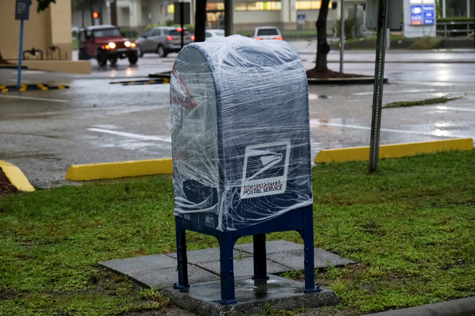 A U.S. postal service mailbox is dry wrapped as Hurricane Ian approaches Florida’s Gulf Coast in Sarasota, Florida, U.S. September  28, 2022. REUTERS/Steve Nesius