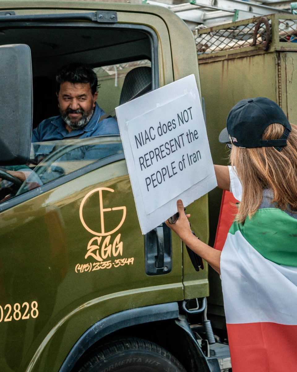 Pro-Iran protesters approached cars on the street, outside San Francisco, on Mar. 7th 2026. Protesters lined along the streets, engaging with motorists and citizens, voicing support for the Trump administration's intervention in Iran.