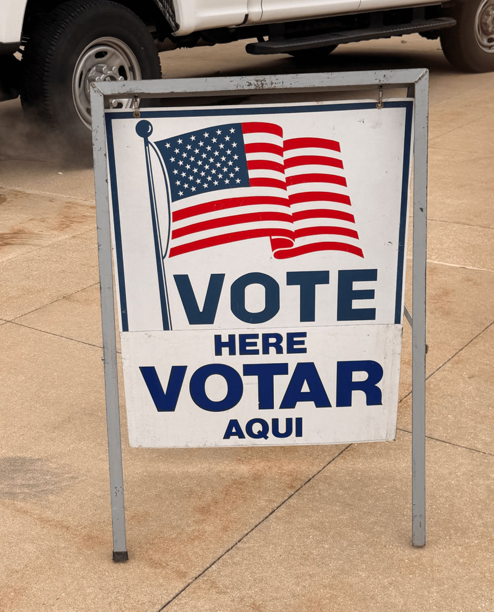 A sign next to the voting truck in front of building B on March  10, 2026. The sign showed students that they were able to go and vote inside of the truck.