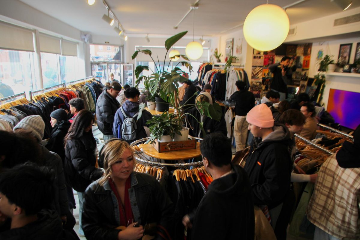 Customers browse racks of clothing inside Elgin Vintage during the store’s two-year anniversary $10 sale, where every item is priced at $10, on Feb. 28, 2026, in downtown Elgin. The two-day sale drew large crowds and highlighted the store’s growth in popularity since it opened in February of 2024.
