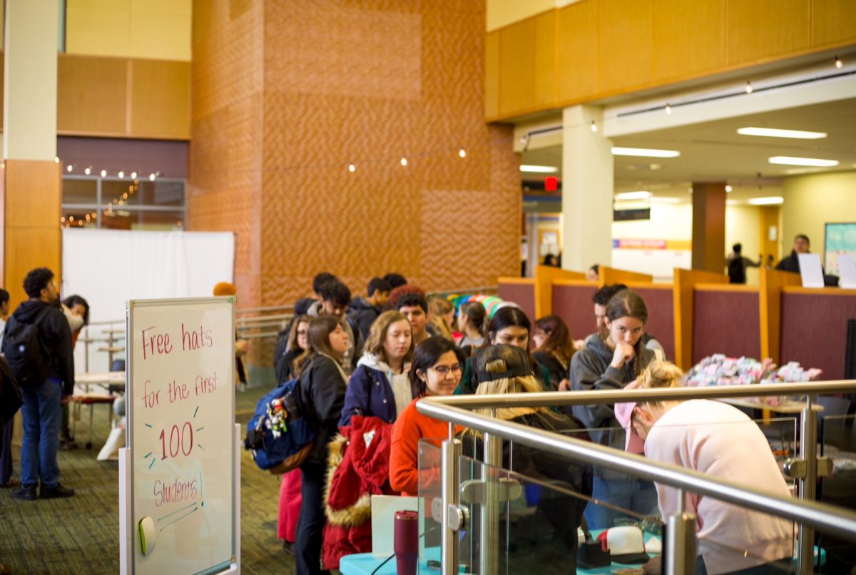 Students lined up at one of the main activities offered at the Women's History Fair at Elgin Community College on March 24th, 2026.