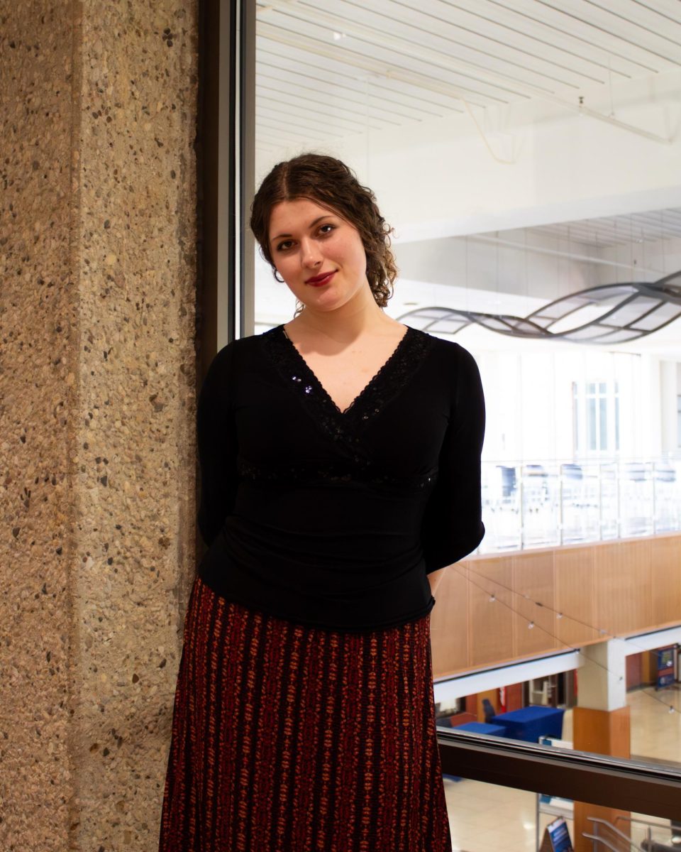 Lillianna Rederer, a second year ECC student, on March 25, 2026. Coffee House and other campus events have helped her find a love for performing and sharing her work with others. “I feel like performing evokes a comfortable nervousness since exposure is hard, yet that exposure could make a change in someone else's day/life. That's why I perform!” says Rederer. 