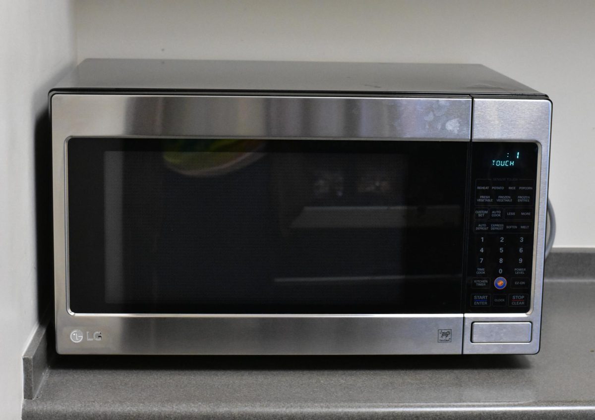 A microwave in a lounge in the A building for students to use on Apr. 27, 2026. The microwave was just used by a student, who took their meal out one second before it was done.